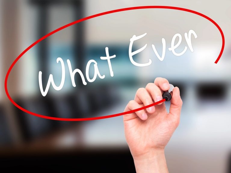 The words What Ever in white writing surrounded by red marker pen