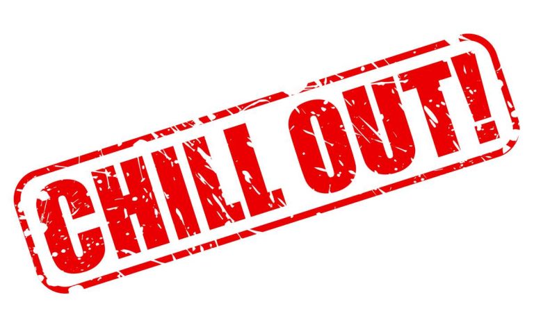 sign reading CHILL OUT in big red letters over a white background